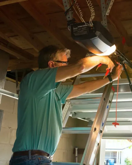 Denver garage door repair technician at work