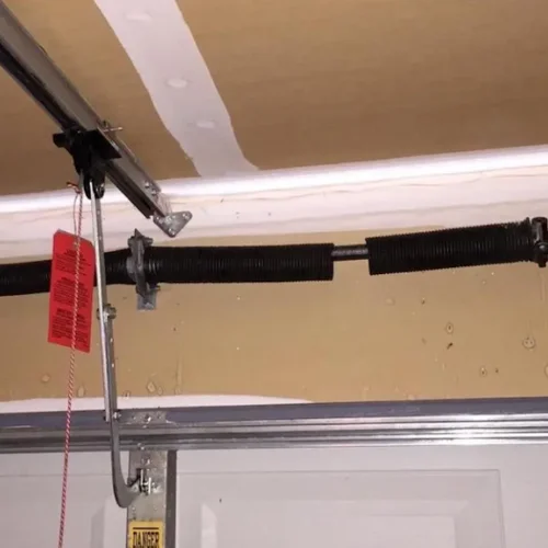 Broken or snapped garage door spring