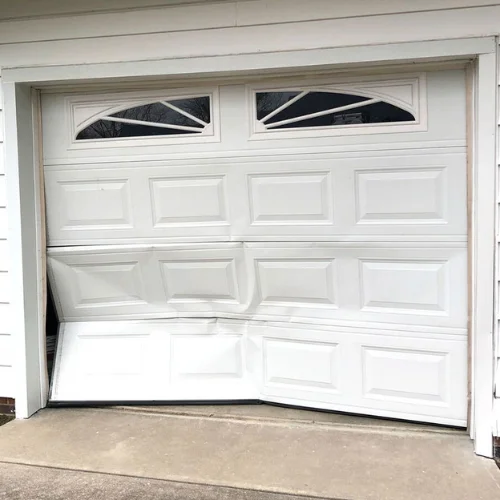 Damaged or dented garage door panel