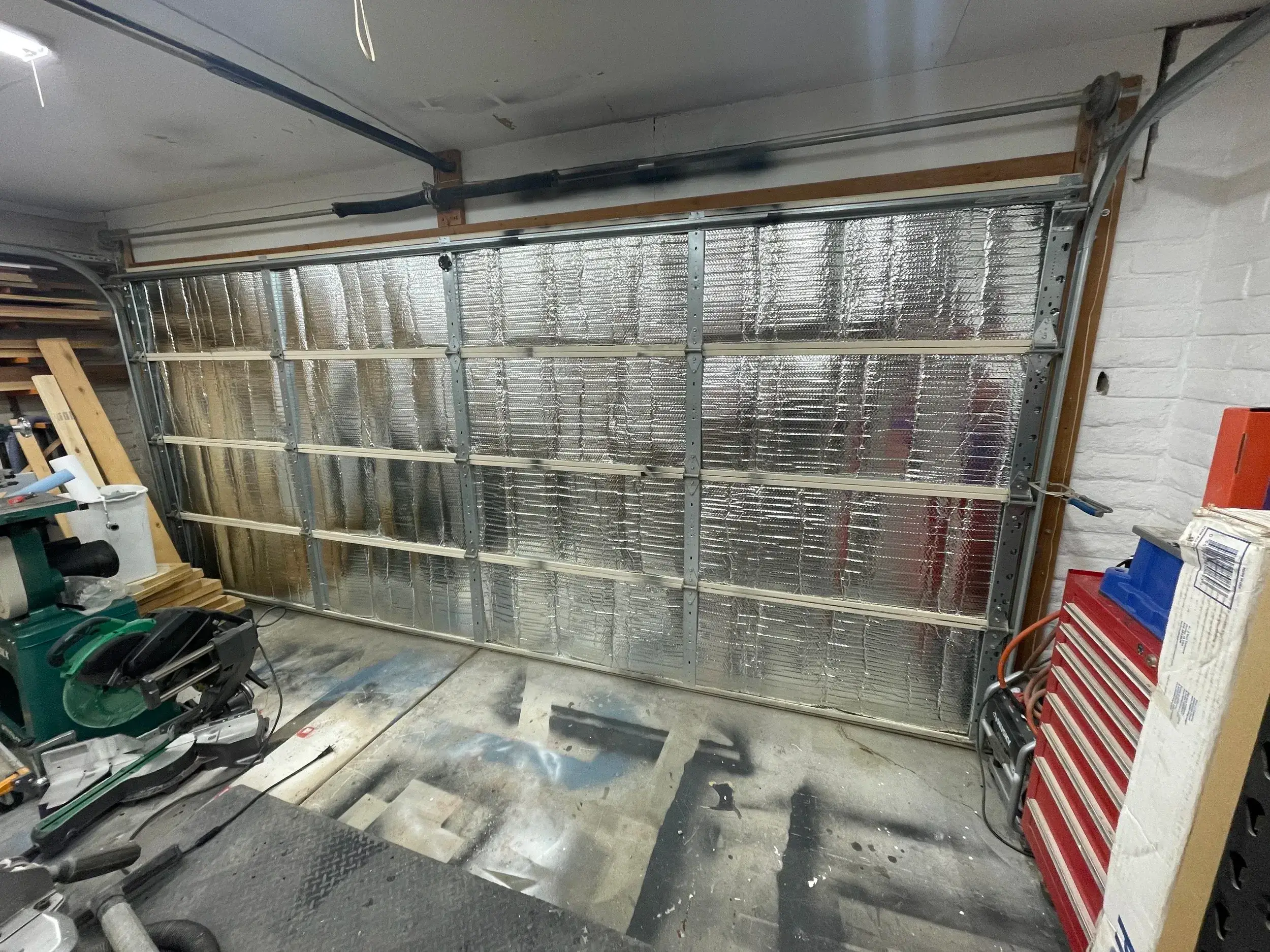 Insulated garage door installation
