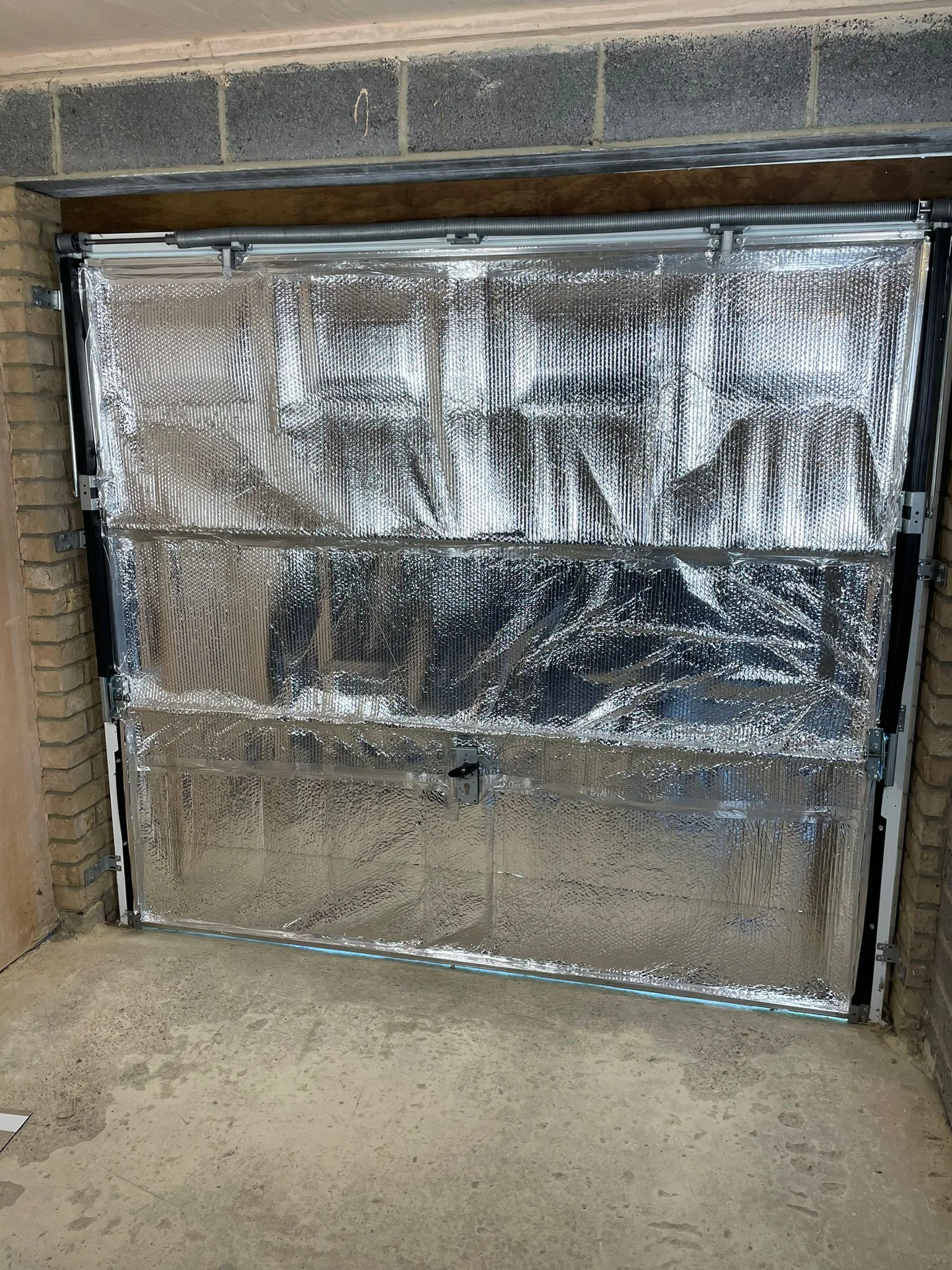 Insulated garage door material Denver
