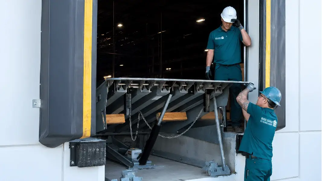 Warehouse and loading dock door repair technician working in Denver, CO