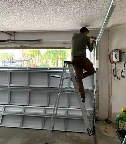 Garage door off-track repair technician in Denver, CO