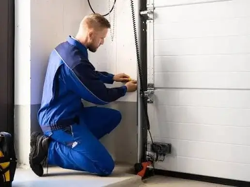 garage door panel repair and replacement