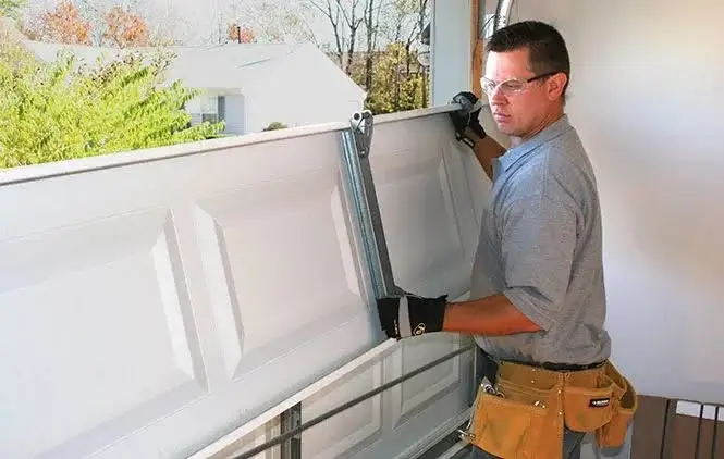 Garage door panel repair technician in Denver, CO