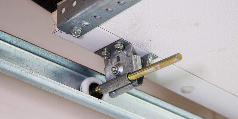 Garage door roller repair technician in Denver, CO