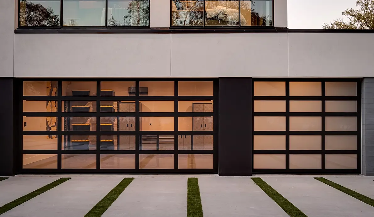 Custom glass and steel garage door installation in Denver