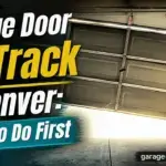 Garage door off track with a roller out of the rail in a Denver home
